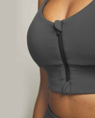 Top deportivo cremallera gris ceniza